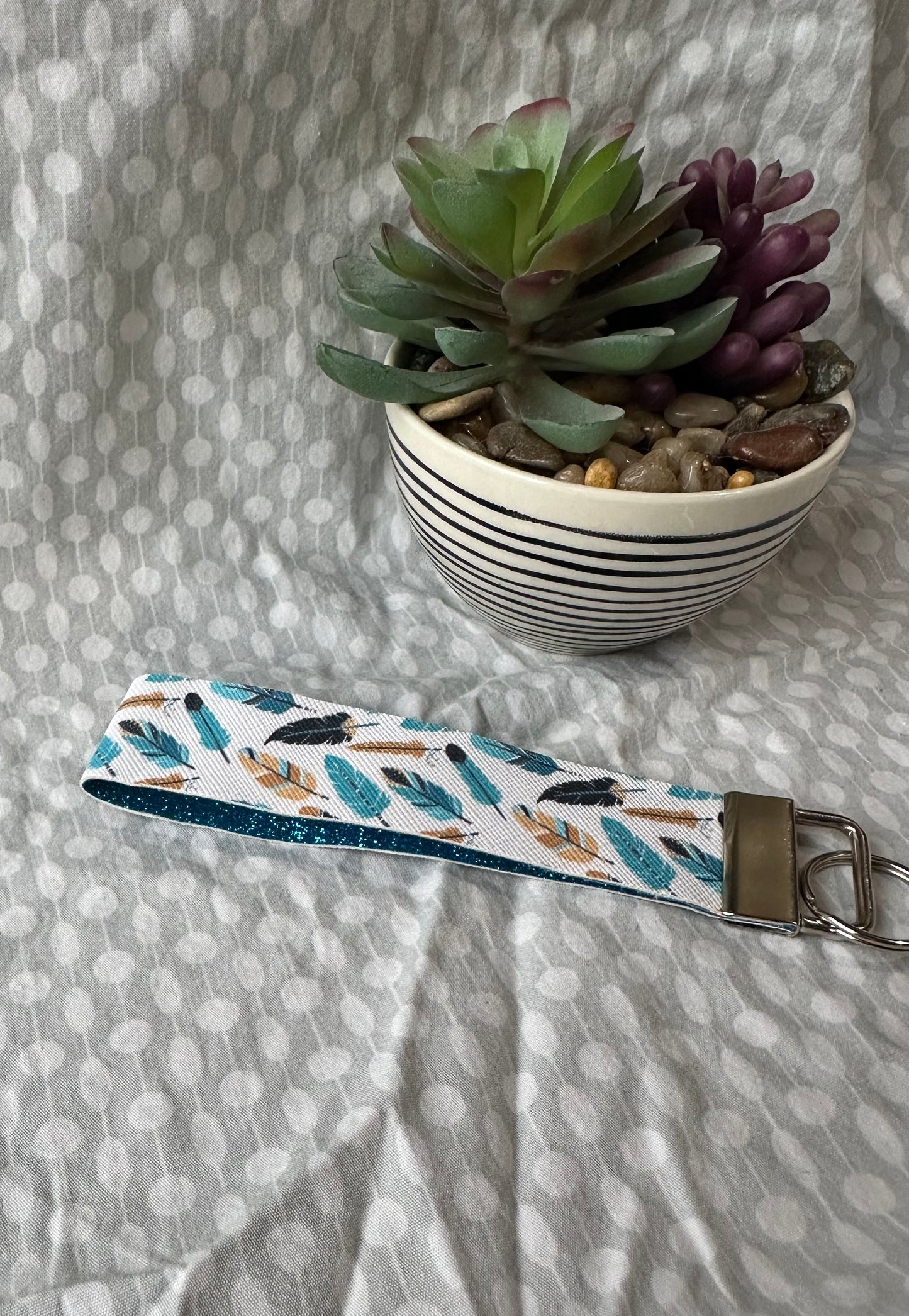 Aqua Feather Faux Leather Wristlet